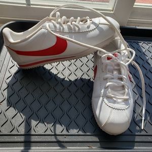 Red and white leather sneakers